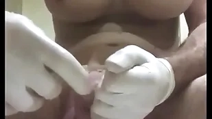 Successful derriere plug with condom wrapround into urethra